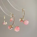 Detailed macro view of pink resin cherry earrings with golden leaf accents and stud backing - 11# Silver Earring Post - Pink & Gold - Cherry Shape