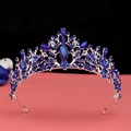 Macro detail of Baroque silver crown featuring deep blue crystal floral vine patterns - Silver Royal Blue Crystal Crown