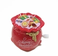 Wind-up red Christmas lucky bag toy with Merry Christmas text and golden bow detail - Wind-up Gift Bag