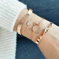 Ensemble de quatre bracelets minimalistes en or rose avec motifs martelés et diamants - 3030
