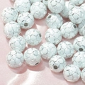 Macro shot of white acrylic soccer beads with silver lines for DIY jewelry making crafts - 10mm Soccer White/Silver Line