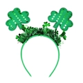 Detailed view of green sequined shamrock headband for St. Patrick’s Day party hair accessory - Large Sequin Shamrock Headband