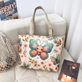 Ethnic style canvas tote bag with butterfly print and durable woven handles on sofa - Style 4