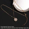 Collar de trébol dorado con colgante floral de circón púrpura y cadena de acero - Estilo Giratorio 50 Strass Púrpura (A704)