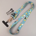 Adjustable blue crossbody phone strap featuring cartoon airplane and rainbow patterns - Breezy Sunny