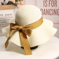 Beige wide brim straw sun hat featuring a stylish yellow and black striped bow ribbon - M (56-58cm) / Milky White