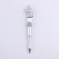 Detail of creative ballpoint pen with a gray cartoon goat and sparkling rhinestone beads - Gray Goat
