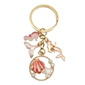 Golden ocean keychain with enamel seahorse, mermaid tail, shells, and elegant pearls - Pink Mermaid Shell