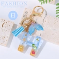 Letter H ocean themed keychain with blue tassel and shell resin charms for summer beach style - Letter H