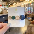 Elegant pearl hair clip with multi-colored vintage discs on a white display card - Vintage Four Disc Hairpin / Blue Combo