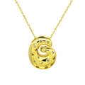 Close-up of a gold bubble letter G pendant with cubic zirconia inlay on a necklace - Letter G / Gold