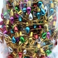 Macro shot of colorful pointed Christmas beads and gold wiring in transparent packaging - 5 Meters per Roll / Gold String Electroplated Colorful Beads