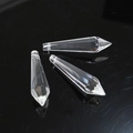 Macro detail of three faceted crystal glass teardrop pendants for DIY lighting decor - Pointed Cone Transparent (63mm)