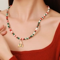Christmas necklace with red green white beads and gold reindeer pendant for women - D1214 Single Layer Beaded Reindeer Gift Pendant