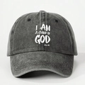 Close-up of I AM A CHILD OF GOD text on charcoal washed cotton vintage baseball cap - Black