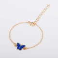 Minimalist gold chain bracelet with blue enamel butterfly charm and adjustable lobster clasp - Blue