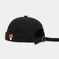 Detail of mushroom embroidery and adjustable brass buckle on black brimless hat - Black