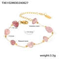 Vue détaillée d'un bracelet en acier inoxydable doré avec pierres naturelles roses - Bracelet / Rose