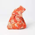 Detail of red Japanese wave pattern on a cotton wrist knot bag with asymmetrical handles - Gilded Red