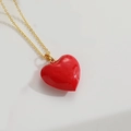 Detailed view of glossy red enamel heart pendant on a delicate gold link chain - Large Red Heart (XL3425-1)