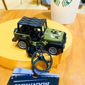 Detail of army green camouflage jeep keychain with black ring and bell accessory - Green Grid Camouflage