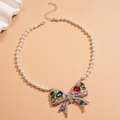 Collana di perle di lusso con un pendente a fiocco in strass e una catena regolabile - Collana di Perle Con Fiocco Multicolore