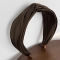 Detail of dark brown twisted headband in glossy satin fabric with elegant ribbon ends - Coffee