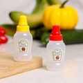 Mini bottiglie per condimenti in plastica con tappi gialli e rossi per salse varie - Miele + Ketchup al Pomodoro Set da 2 Pezzi