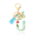 Letter U crystal keychain with red dried flowers, butterfly charm and blue tassel - Letter U