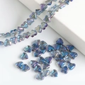 Iridescent blue-purple heart-shaped glass beads for DIY jewelry and bracelet making - Transparent Blue