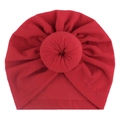 Red baby turban hat featuring a cute donut knot design on a soft fabric material - One Size / Red