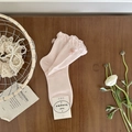 Light pink cotton crew socks with delicate bow and ruffled cuff on wooden background - One Size / Light Pink