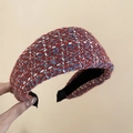 Detailed close-up of thick French tweed headband with red, blue and white knit texture - Mixed Red