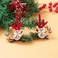 Christmas hair clips featuring red reindeer antlers with pine needles and golden berries - Christmas Clip Style 20
