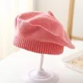 Soft pink knit beret for babies featuring a ribbed brim and cute top stem detail - Pink