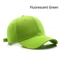 Classic six-panel baseball cap in fluorescent green featuring a curved brim and cotton finish - Adjustable / Fluorescent Green