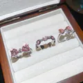 Driedelige ringenset met roze hartkristallen en fonkelende strikontwerpen in een doosje - Zilver Roze 3-delige Set