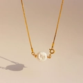 Elegant gold snake chain necklace featuring a unique white baroque pearl pendant - Water Drop Pearl Style