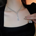 Elegant silver teardrop jewelry set with crystal necklace and earrings on model - Silver V-shape Tassel (21#)