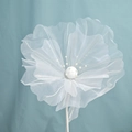 Close-up of a handmade white organza decorative flower with a central pearl pistil - 50 cm / White