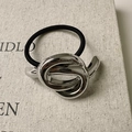 Minimalist silver irregular knotted metal hair tie with black elastic cord on book - Knotted Silver (D-5336-9)