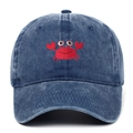 Close-up of red crab embroidery on navy blue washed cotton baseball cap texture - One Size / Navy Blue