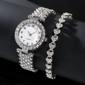 Elegant silver quartz watch with rhinestone-studded heart bracelet set on black background - Watch & Bracelet Set / Silver