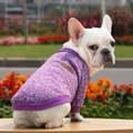 Detail view of purple knitted pet sweater showing classic leather tag and ribbed hem finish - Purple