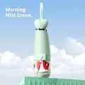 Flat mini UV sun umbrella in morning mist green with heart handle and cartoon eye design - Strawberry Light Green (Heart Handle)