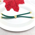 Detail of 3MM Milan rope bracelet in dark green with 18k gold-plated round leaf charm - Turquoise Green