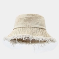 Detail of frayed edges and fringe on a beige denim bucket hat with street fashion style - M (56-58cm) / Khaki