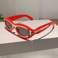 Retro red cat eye Y2K sunglasses with gold trim and black oval lenses in 45-degree view - Red Frame Grey Lens
