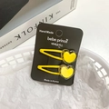 Pair of matte yellow heart hair clips for girls on a black display card holder - [7] Heart Style - Yellow