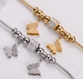 Pulsera de cadena de serpiente con colgante de mariposa en acabados oro y plata pulida - Mariposa Oro Perla
